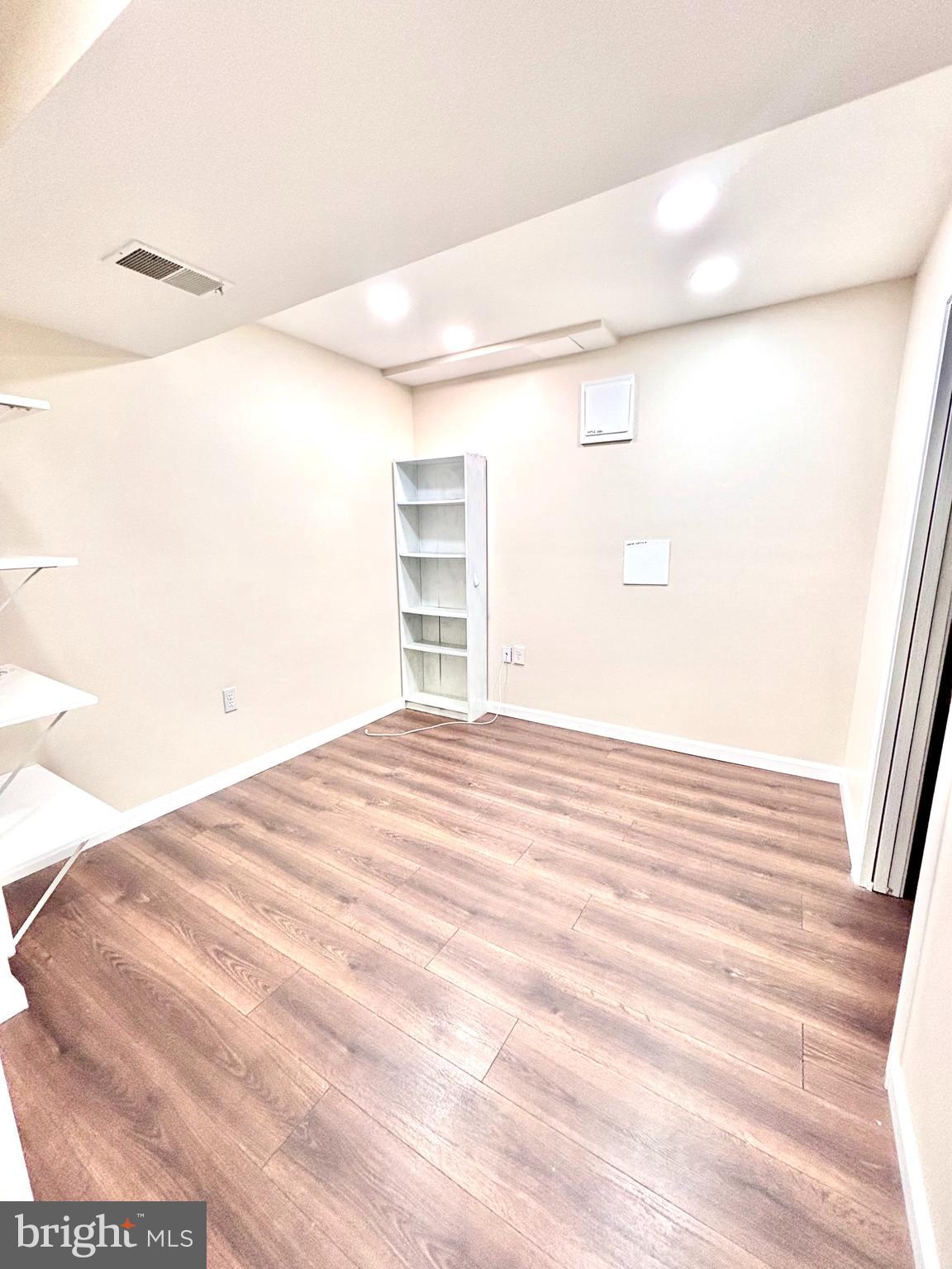 6226 Hillside Road Springfield, VA 22152 - Photo 31 of 37 a view of empty room with wooden floor