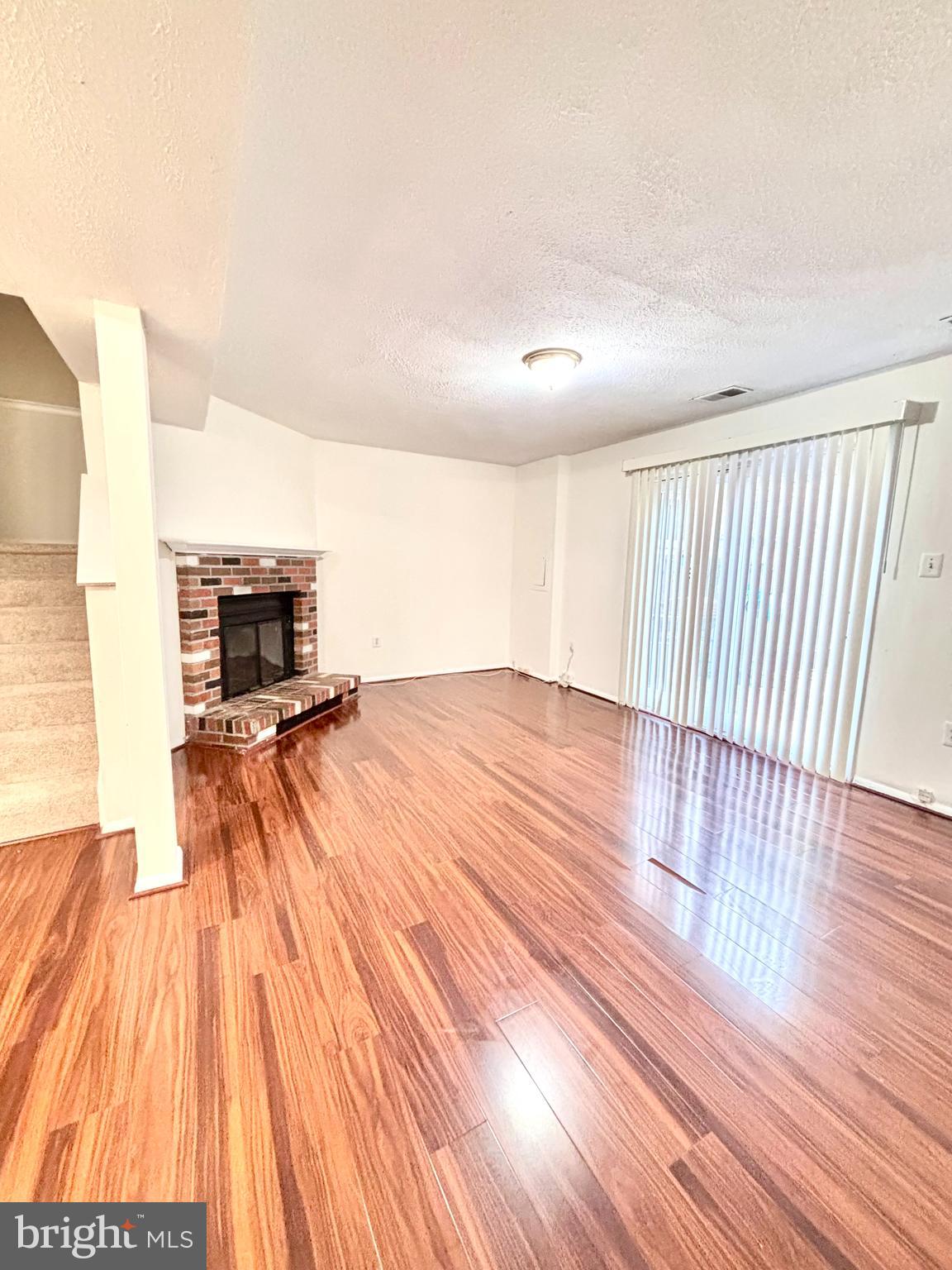 6226 Hillside Road Springfield, VA 22152 - Photo 36 of 37 a view of empty room with wooden floor and fan