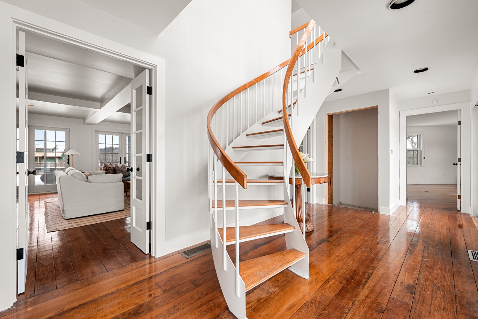 6 Fargo Way Nantucket, MA 02554 - Photo 14 of 28 a view of a livingroom with wooden floor and stairs