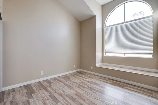 a bathroom with a granite countertop sink shower and a mirror