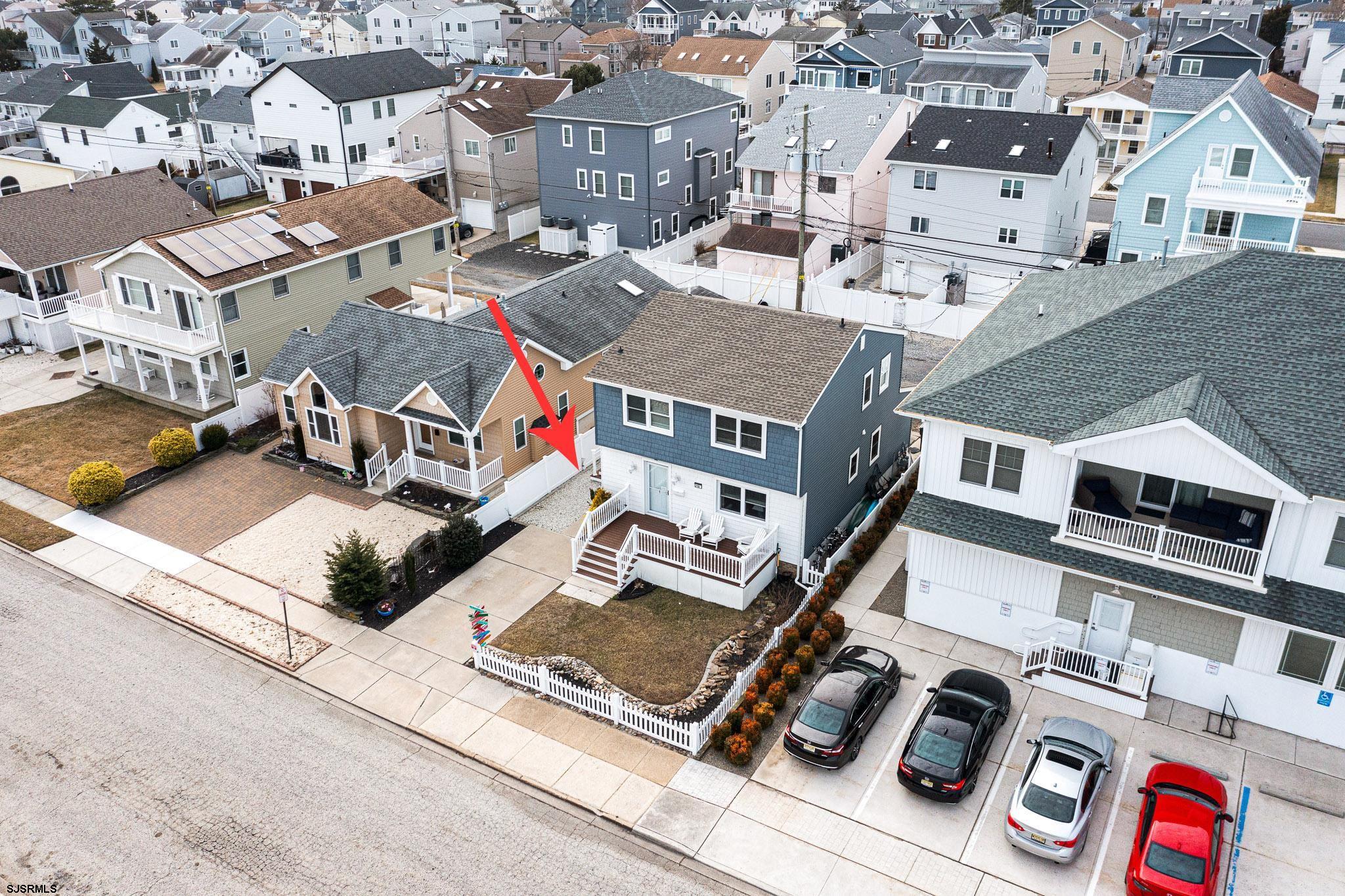 210 34th Street South, Unit 2 Brigantine, NJ 08203 - Photo 29 of 32 an aerial view of residential houses with outdoor space