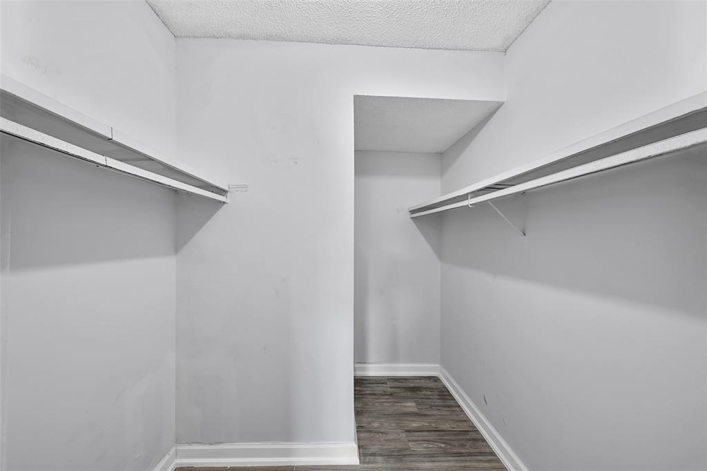 7541 Northwest 16th Street, Unit 1211 Plantation, FL 33313 - Photo 12 of 23 a view of an empty walk in closet