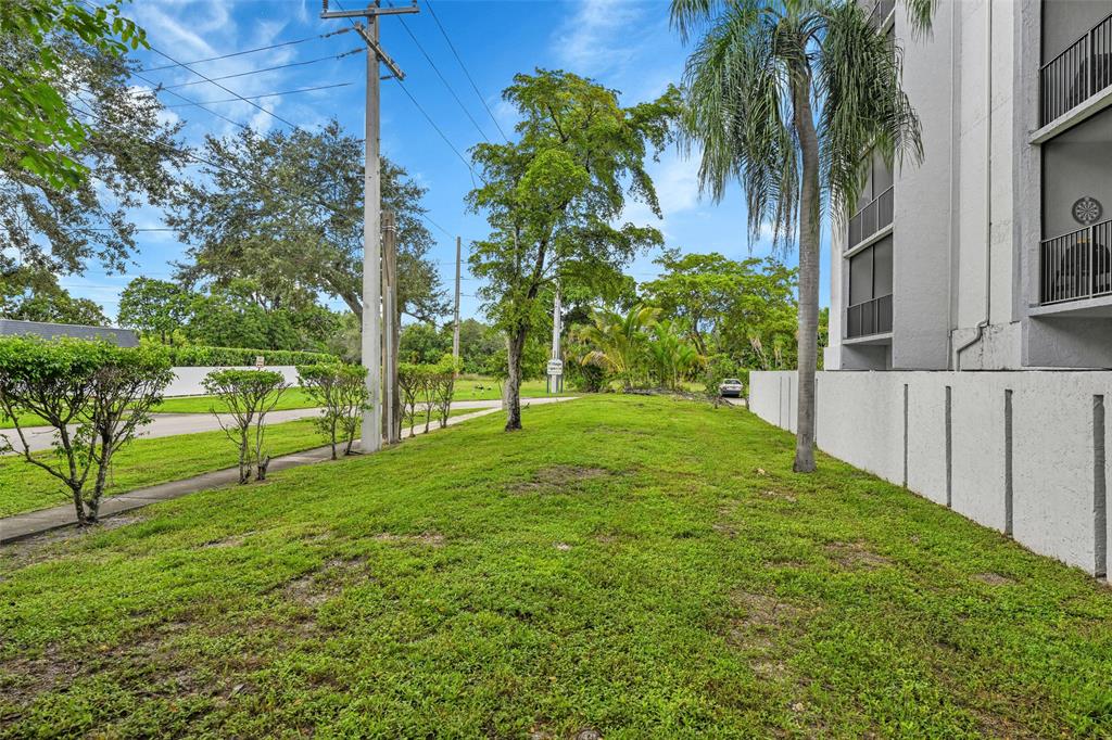7541 Northwest 16th Street, Unit 1211 Plantation, FL 33313 - Photo 22 of 23 a view of a park with a tree