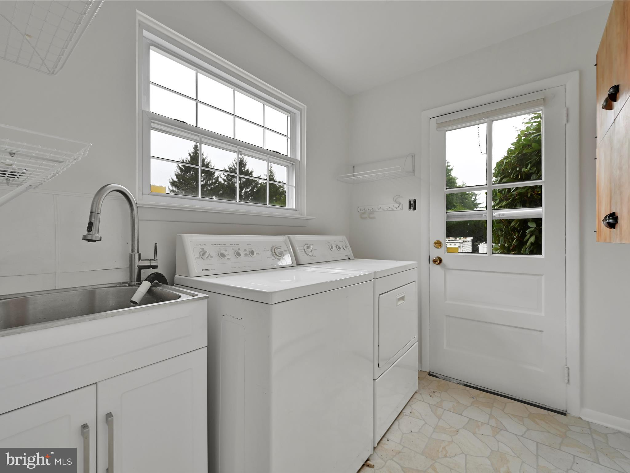 14 Stone Ridge Road Thornton, PA 19373 - Photo 18 of 45 a utility room with dryer and washer
