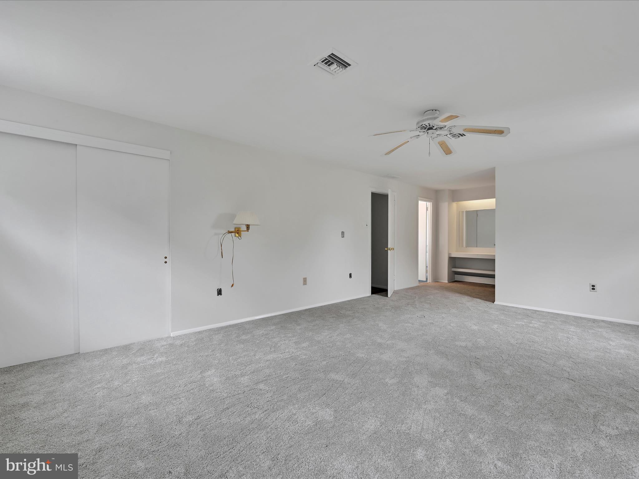 14 Stone Ridge Road Thornton, PA 19373 - Photo 25 of 45 a view of an empty room with a ceiling fan