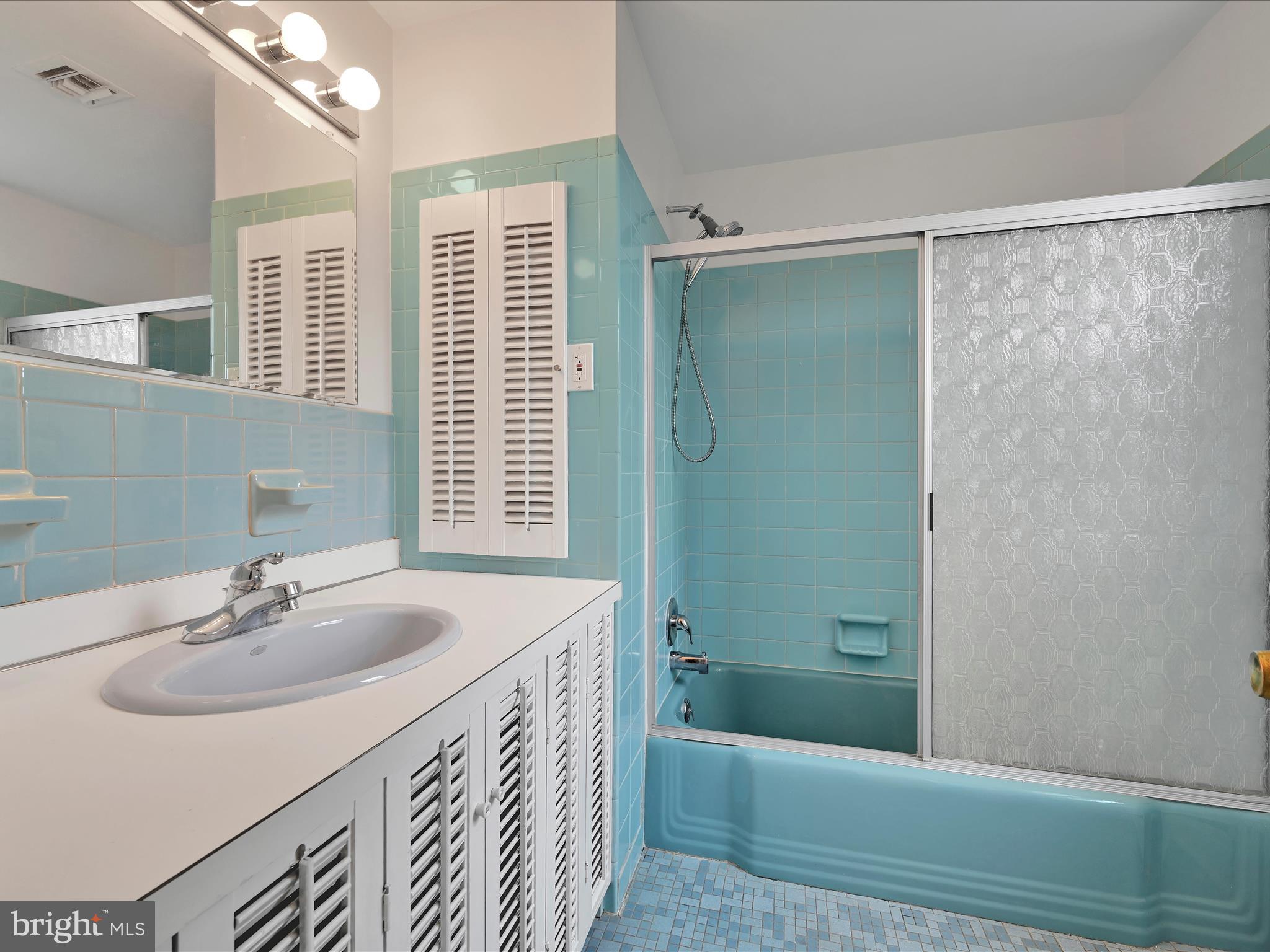 14 Stone Ridge Road Thornton, PA 19373 - Photo 26 of 45 a bathroom with a sink a toilet and shower