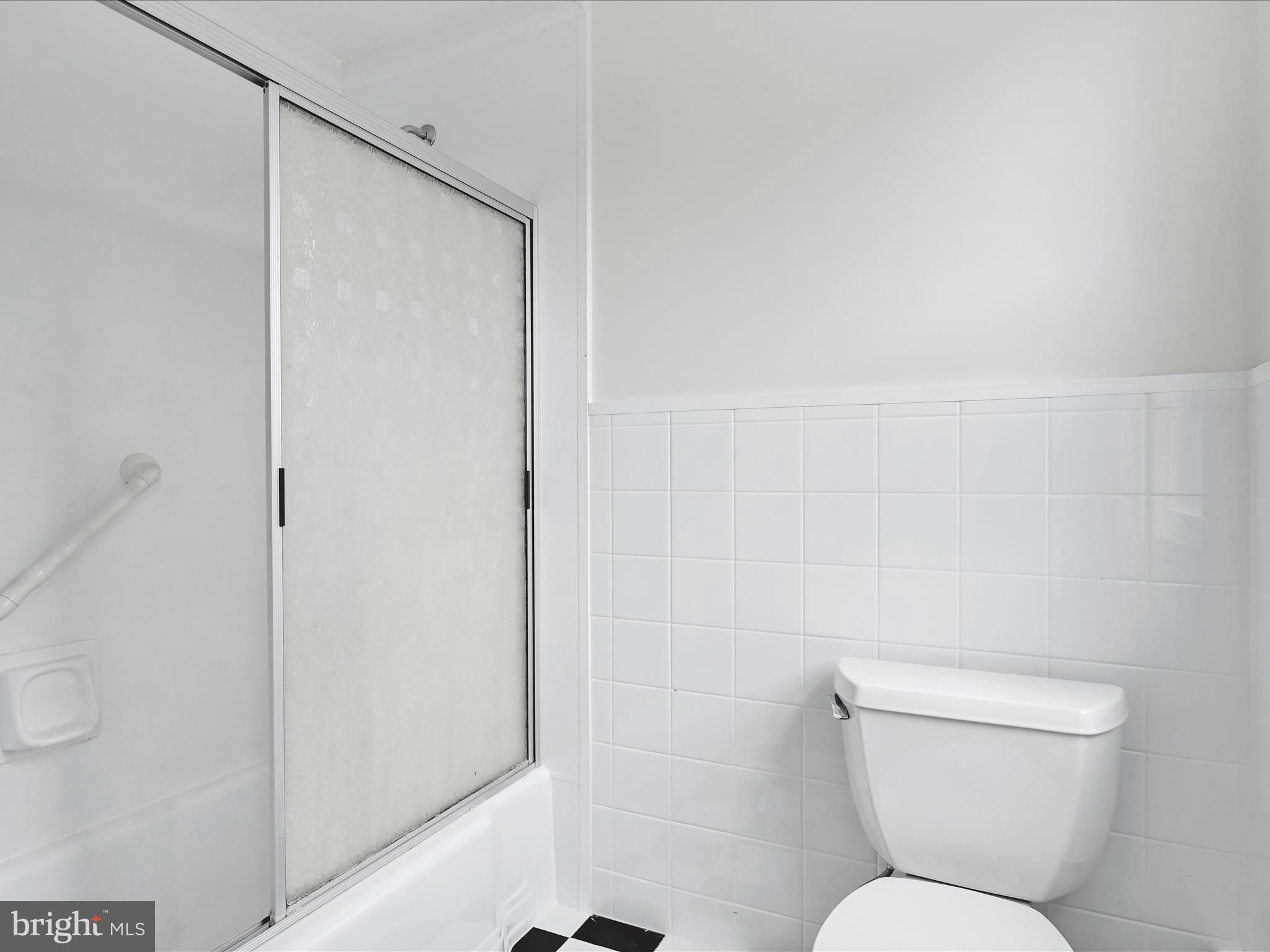 14 Stone Ridge Road Thornton, PA 19373 - Photo 34 of 45 a white toilet sitting next to a shower