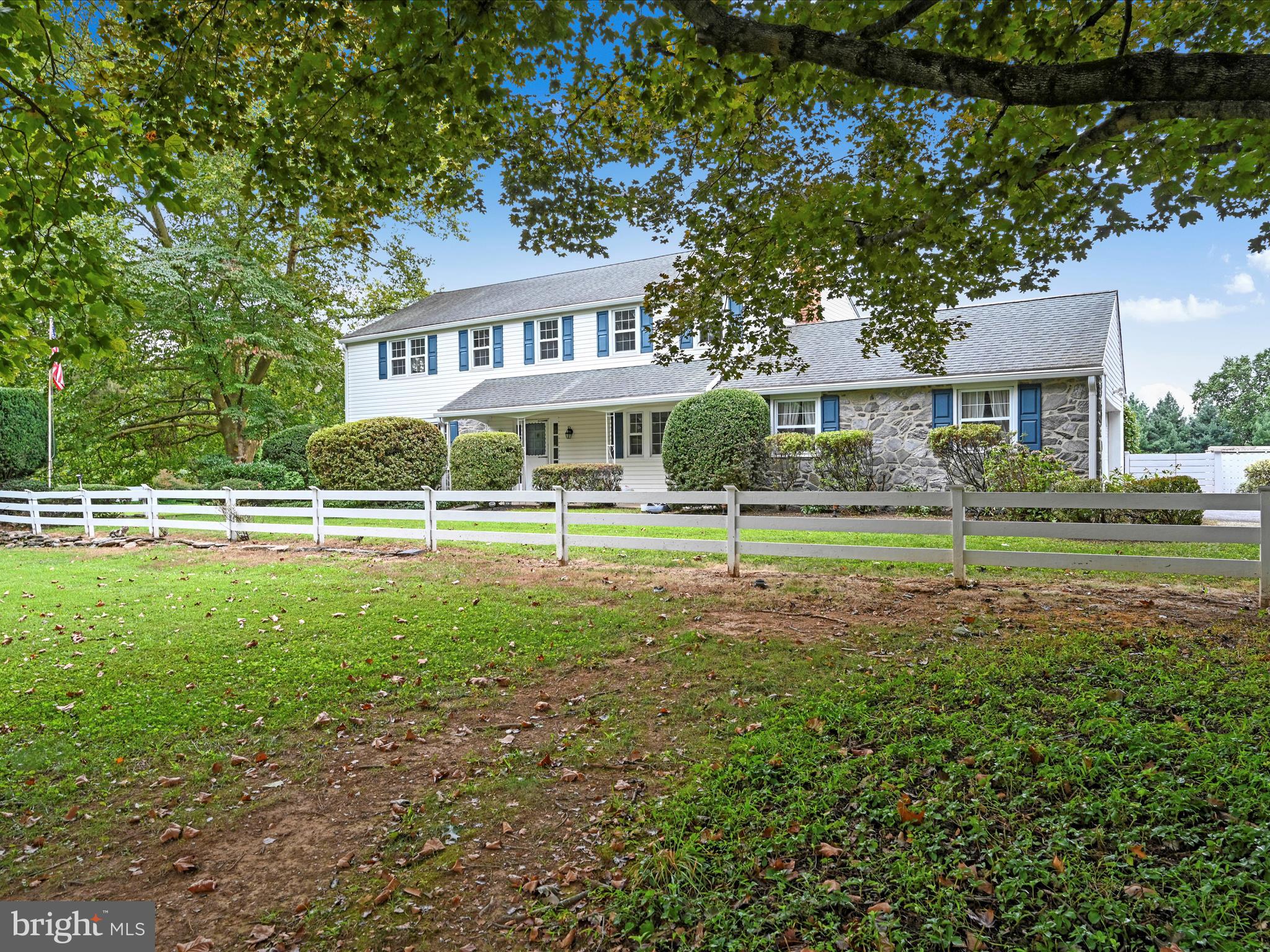 14 Stone Ridge Road Thornton, PA 19373 - Photo 4 of 45 a view of a house with a yard