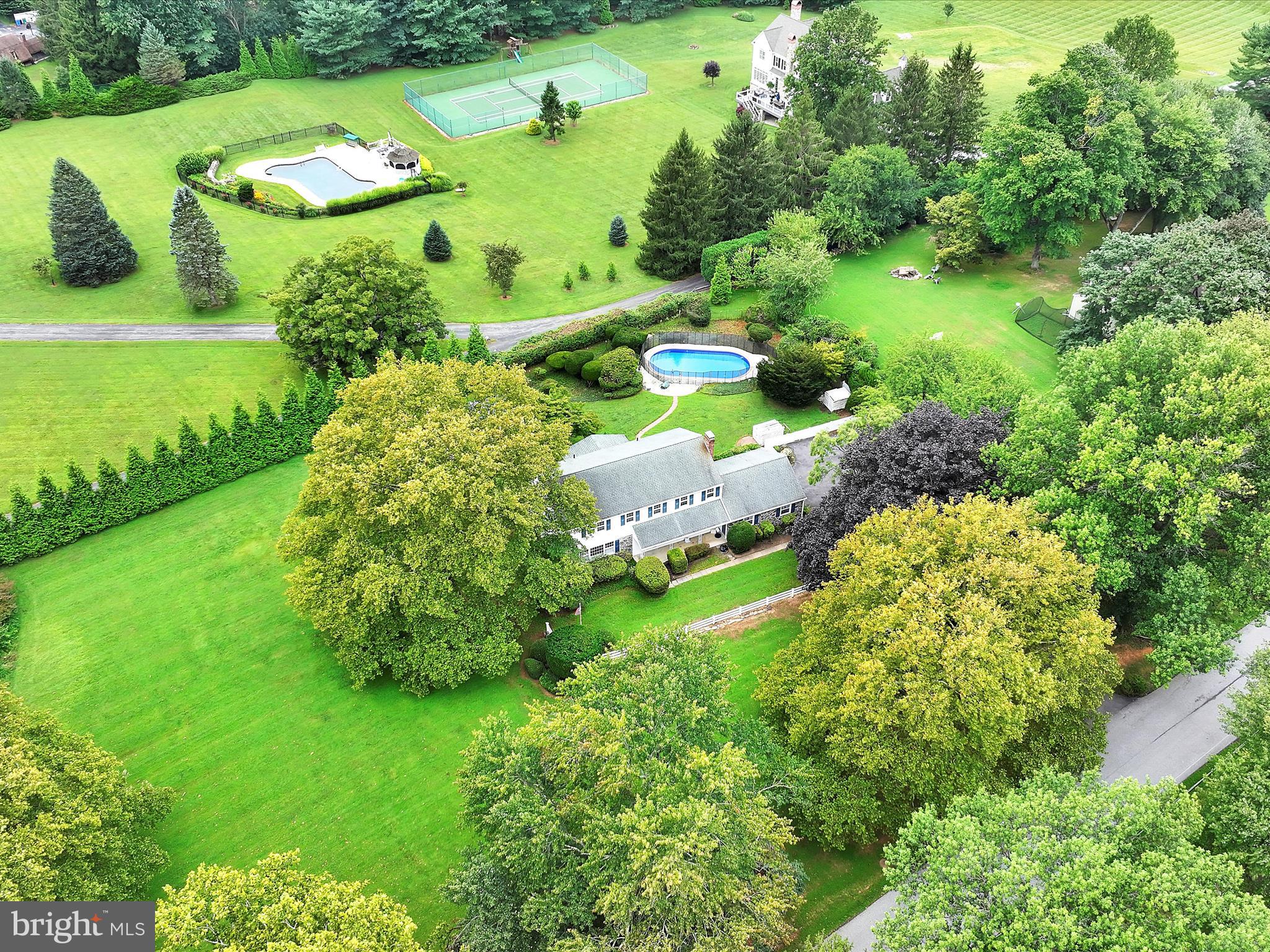 14 Stone Ridge Road Thornton, PA 19373 - Photo 44 of 45 a view of a garden with a building in the background