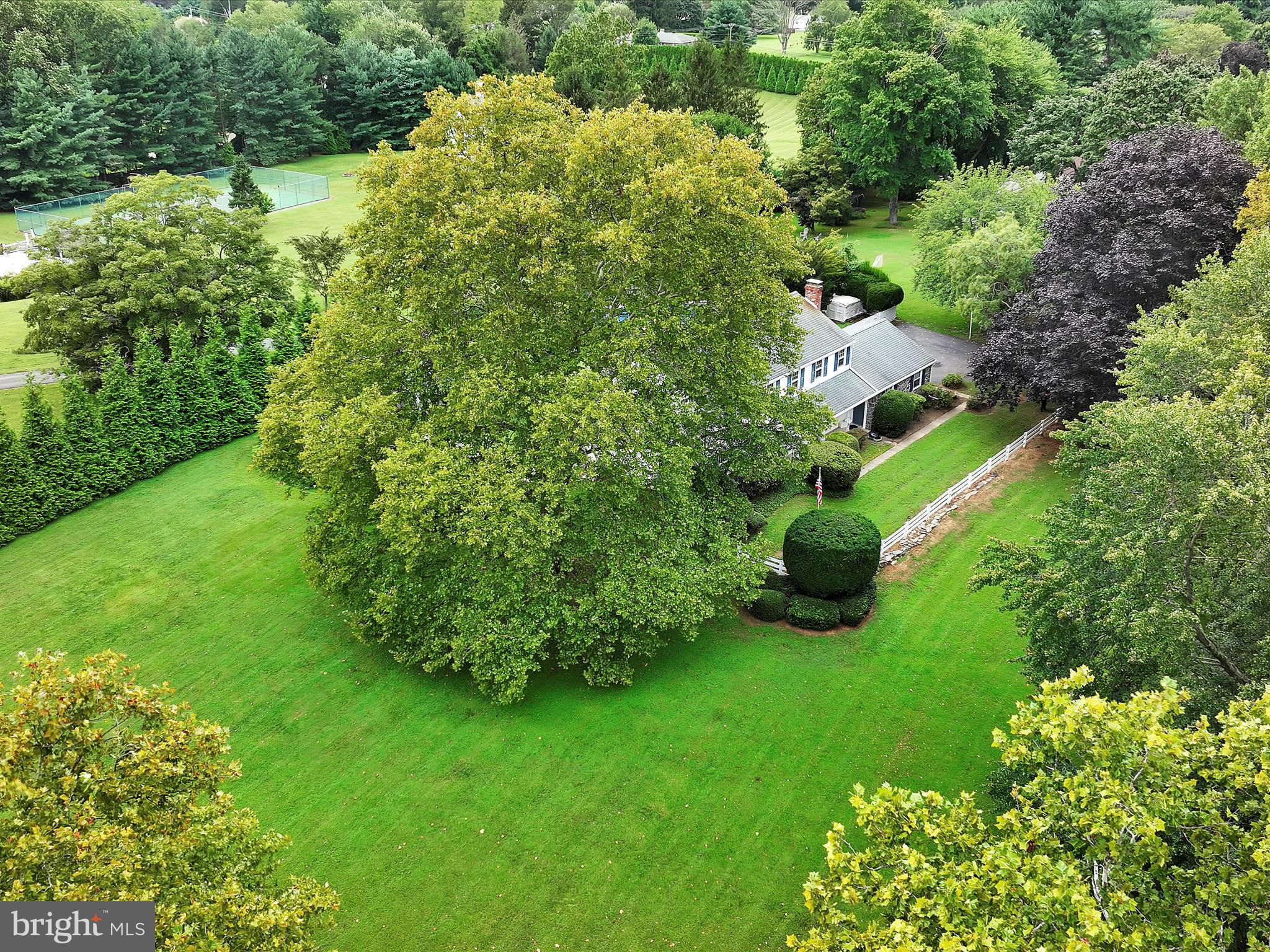14 Stone Ridge Road Thornton, PA 19373 - Photo 45 of 45 an aerial view of a house with a yard