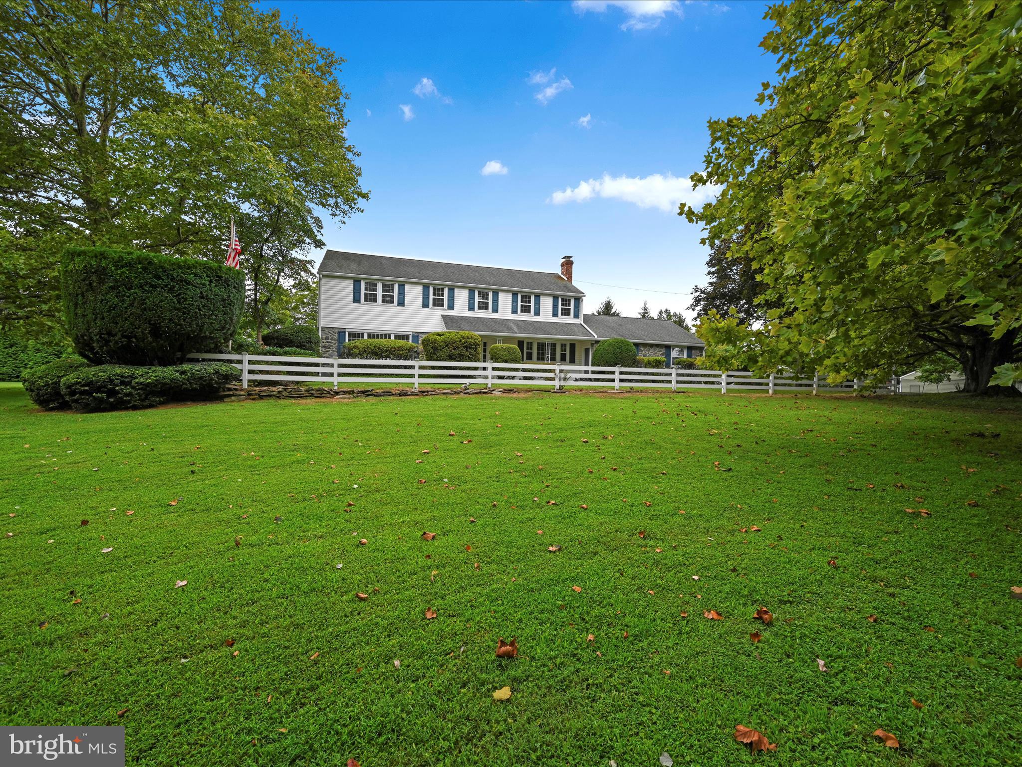 14 Stone Ridge Road Thornton, PA 19373 - Photo 5 of 45 a view of a big house with a big yard