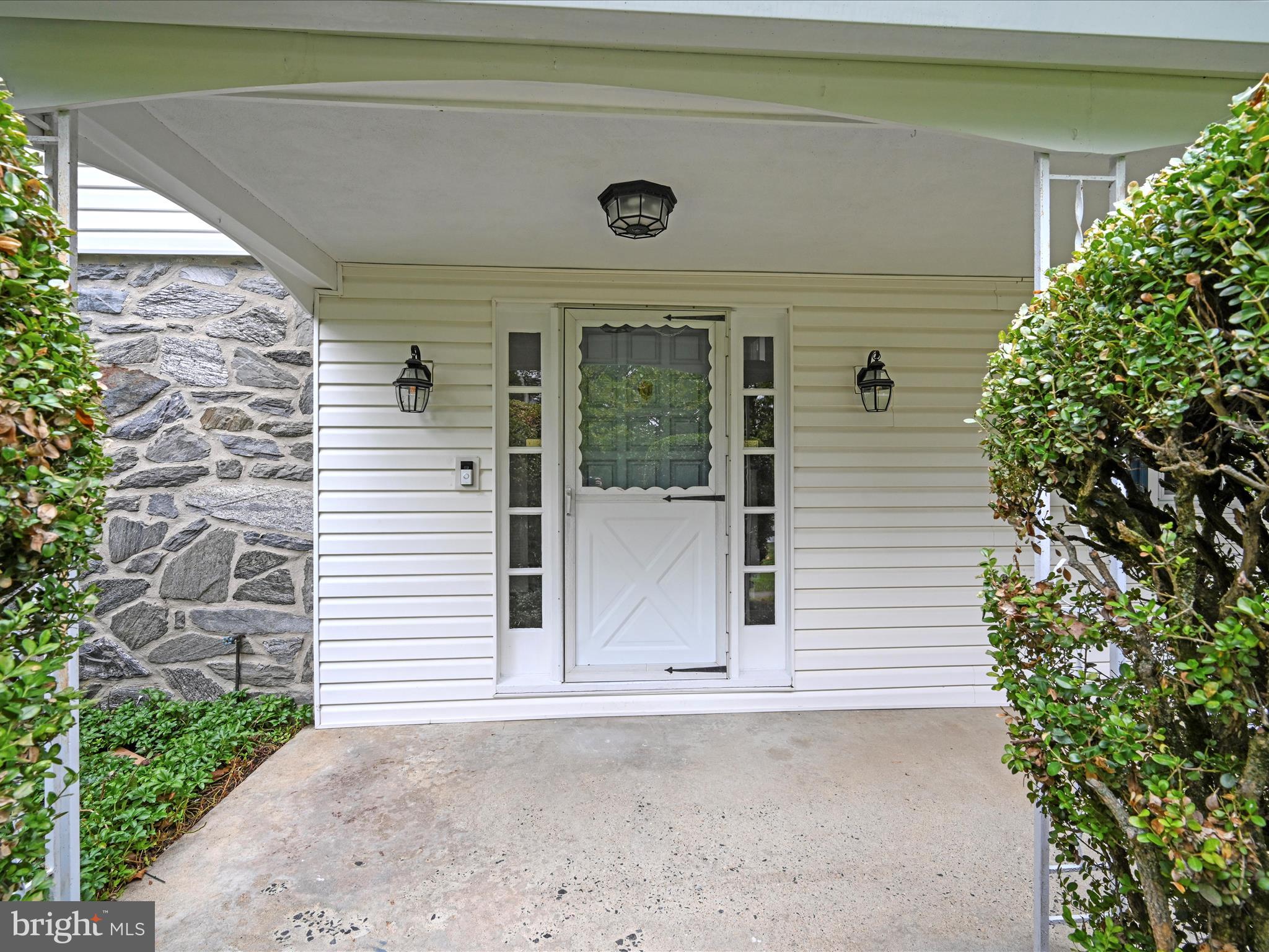 14 Stone Ridge Road Thornton, PA 19373 - Photo 6 of 45 a front view of a house with a yard