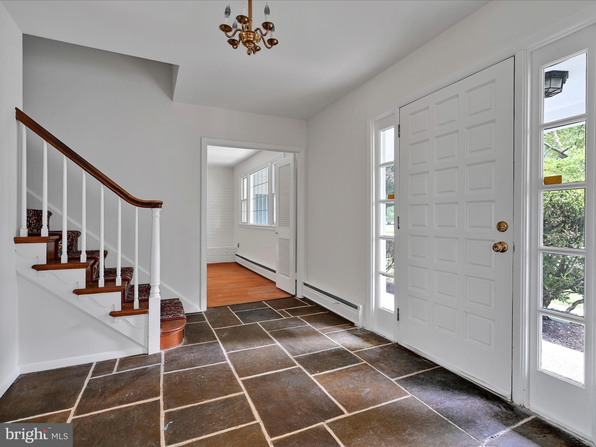 14 Stone Ridge Road Thornton, PA 19373 - Photo 8 of 45 a room with lots of white walls and windows
