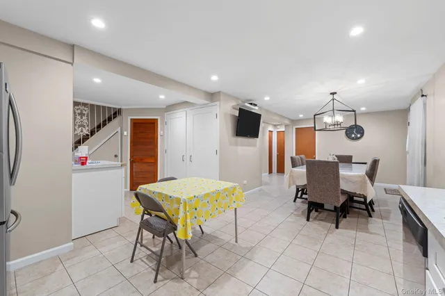 a room with furniture and wooden floor