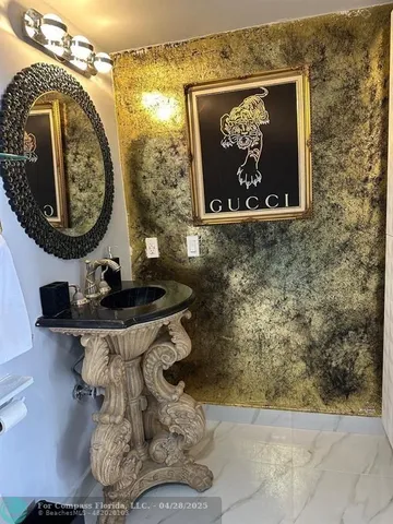 a bathroom with a toilet and a sink