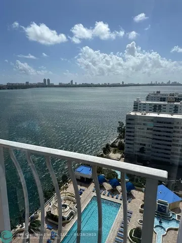 a view of a balcony with lake view