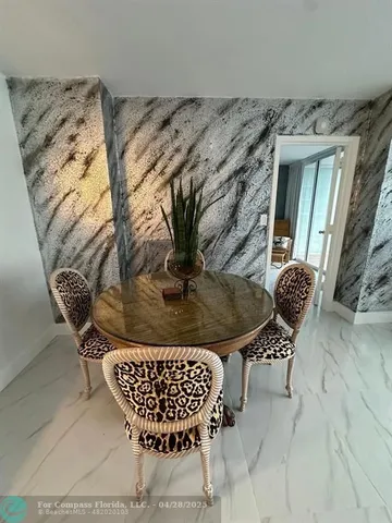 a vase of flowers sitting on a table