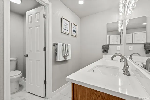 a bathroom with a sink and a toilet