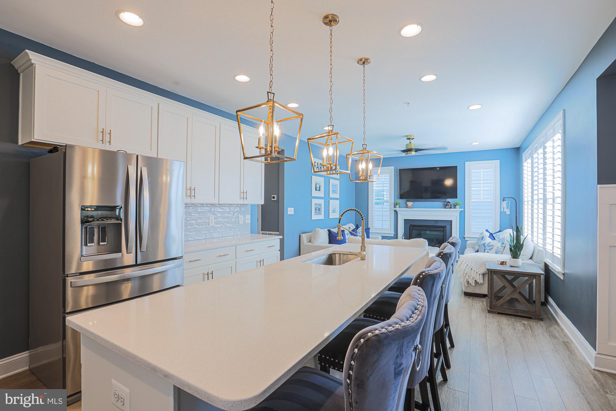 809 Jefferson Pike Brunswick, MD 21716 - Photo 13 of 64 a large kitchen with stainless steel appliances a stove a refrigerator a oven a sink a table and chairs