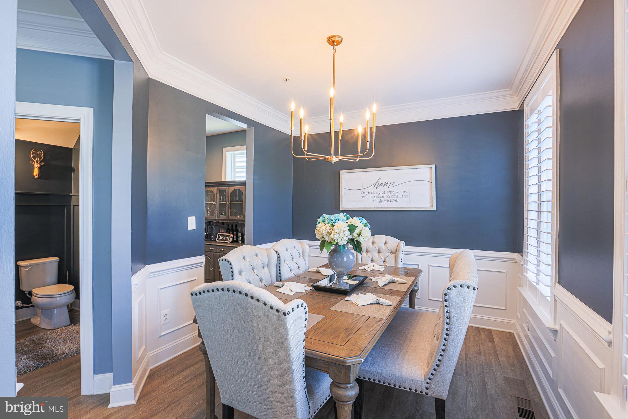 809 Jefferson Pike Brunswick, MD 21716 - Photo 23 of 64 a view of a dining room with furniture
