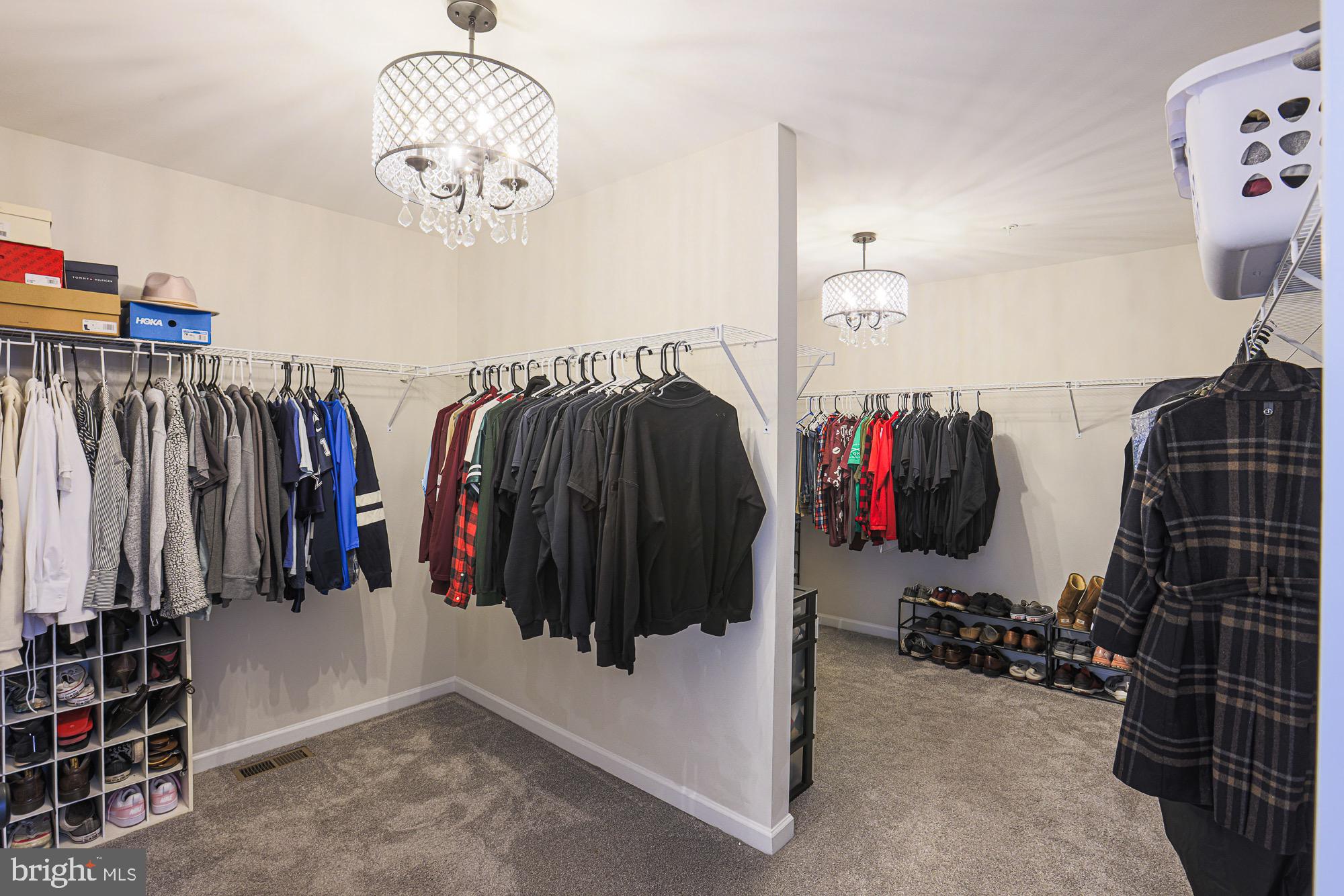 809 Jefferson Pike Brunswick, MD 21716 - Photo 38 of 64 a view of walk in closet with clothes and shoes