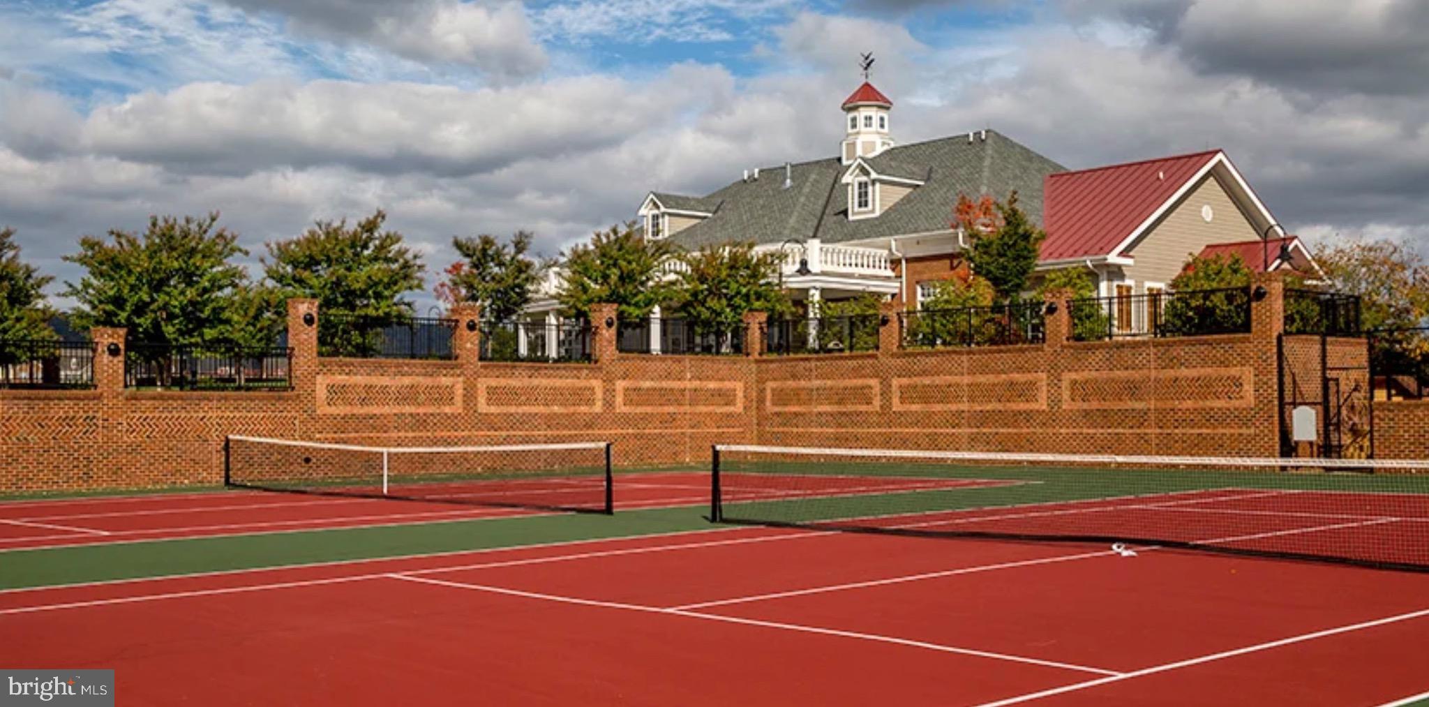 809 Jefferson Pike Brunswick, MD 21716 - Photo 58 of 64 a view of a tennis ground with large trees
