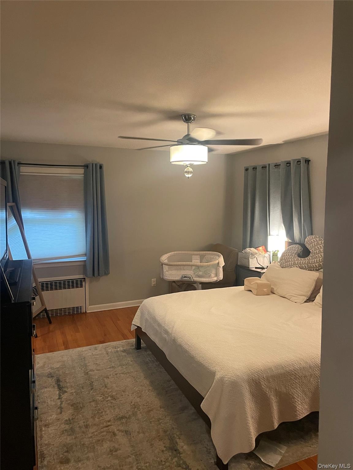 291 North Little Tor Road New City, NY 10956 - Photo 14 of 25 a bedroom with a bed and a mirror