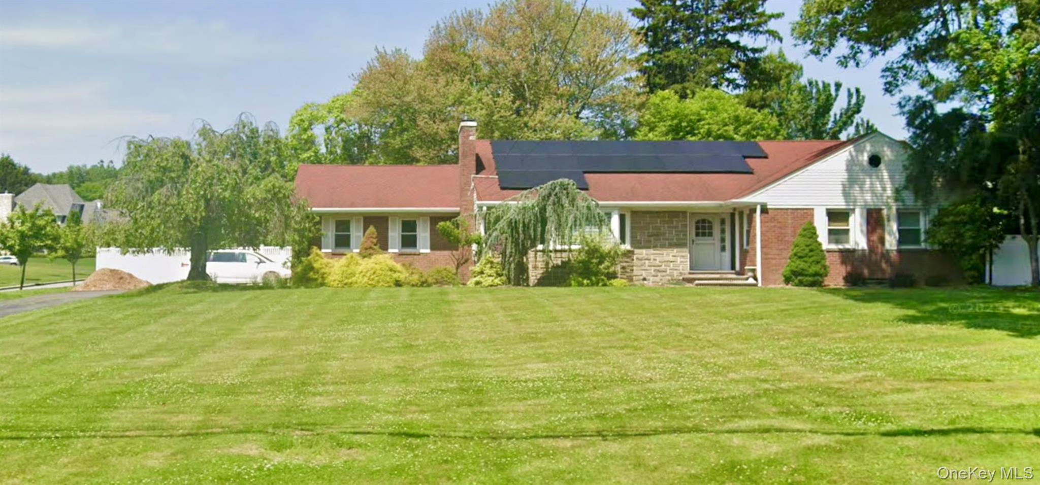 291 North Little Tor Road New City, NY 10956 - Photo 2 of 25 a view of a house with a yard