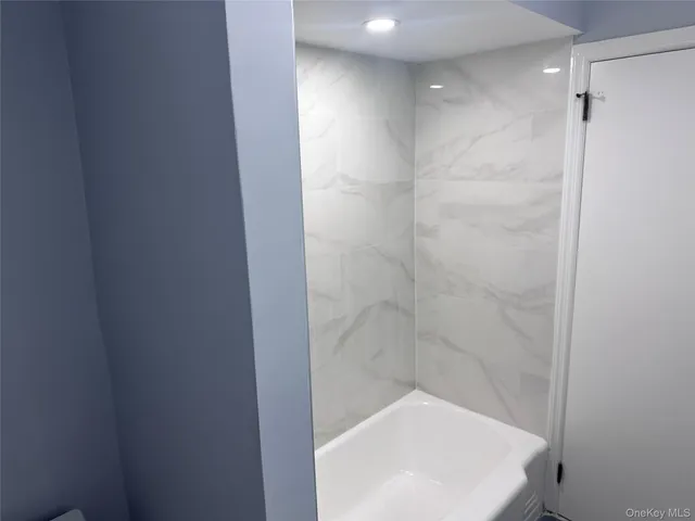 a bathroom with a bathtub