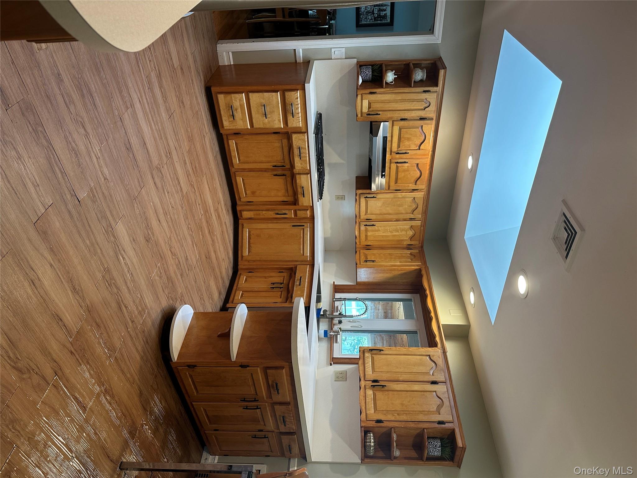 291 North Little Tor Road New City, NY 10956 - Photo 9 of 25 a kitchen with stainless steel appliances granite countertop a sink and cabinets