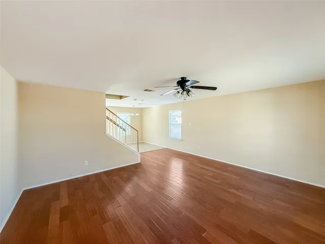 a view of entryway and kitchen with microwave