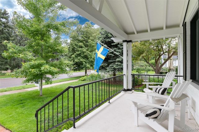 a view of balcony with furniture