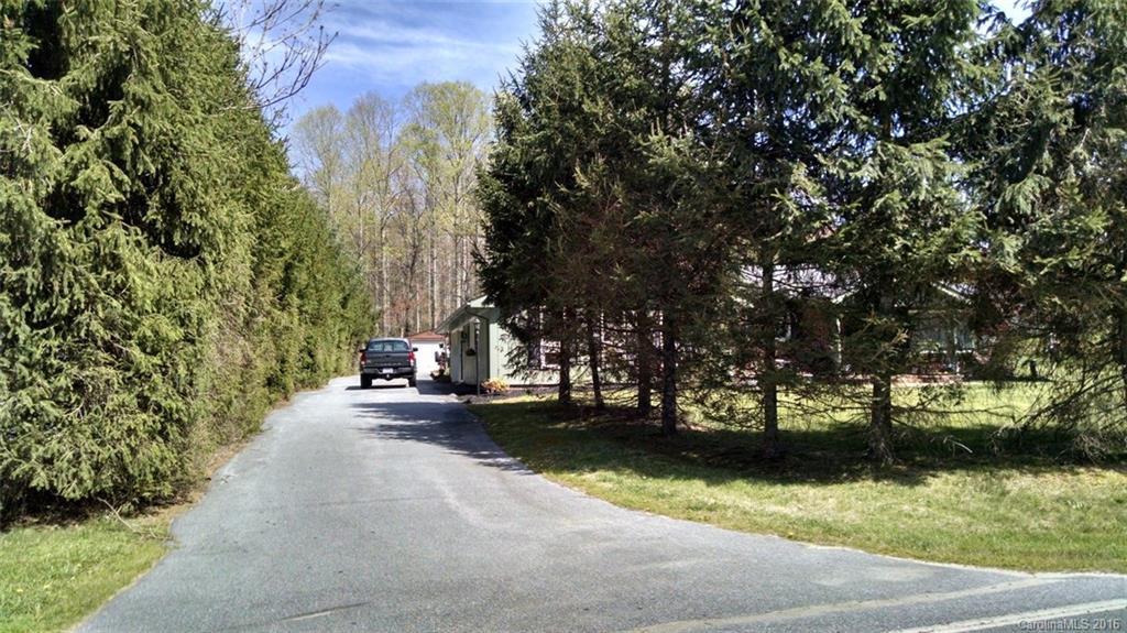 1978 Ridge Road Hendersonville, NC 28792 - Photo 12 of 18 a view of a yard with plants and trees