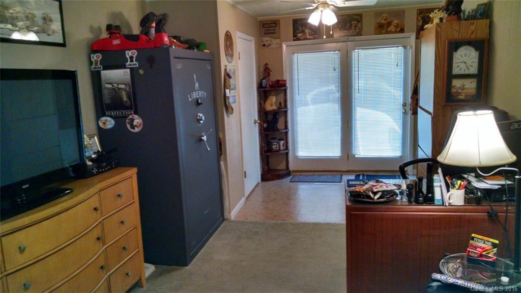 1978 Ridge Road Hendersonville, NC 28792 - Photo 10 of 18 a kitchen with stainless steel appliances granite countertop a refrigerator and a stove