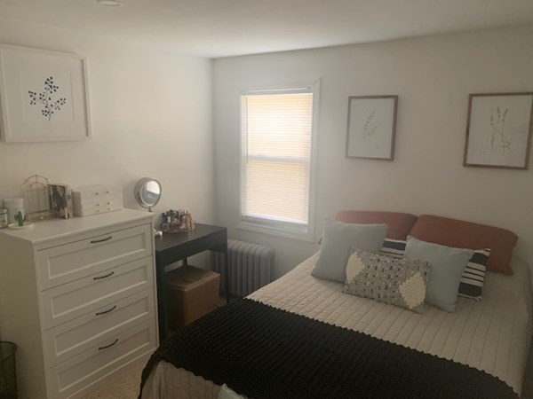 863 Roosevelt Avenue Springfield, MA 01109 - Photo 11 of 18 a bedroom with a bed and window