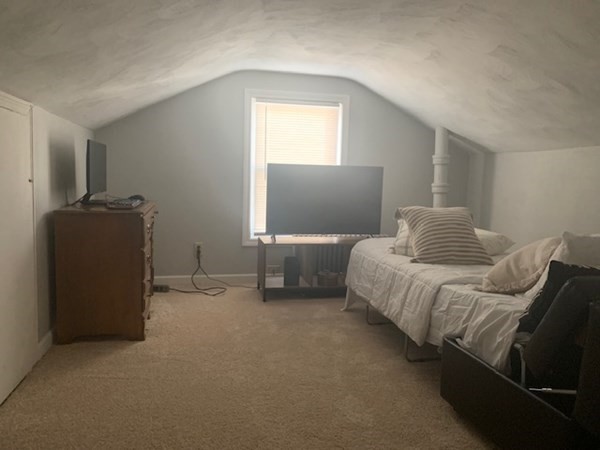863 Roosevelt Avenue Springfield, MA 01109 - Photo 17 of 18 a bedroom with furniture and a window