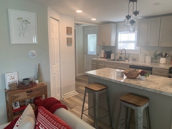 863 Roosevelt Avenue Springfield, MA 01109 - Photo 5 of 18 a kitchen with a sink stove and cabinets