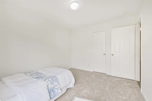 a view of a bedroom with closet
