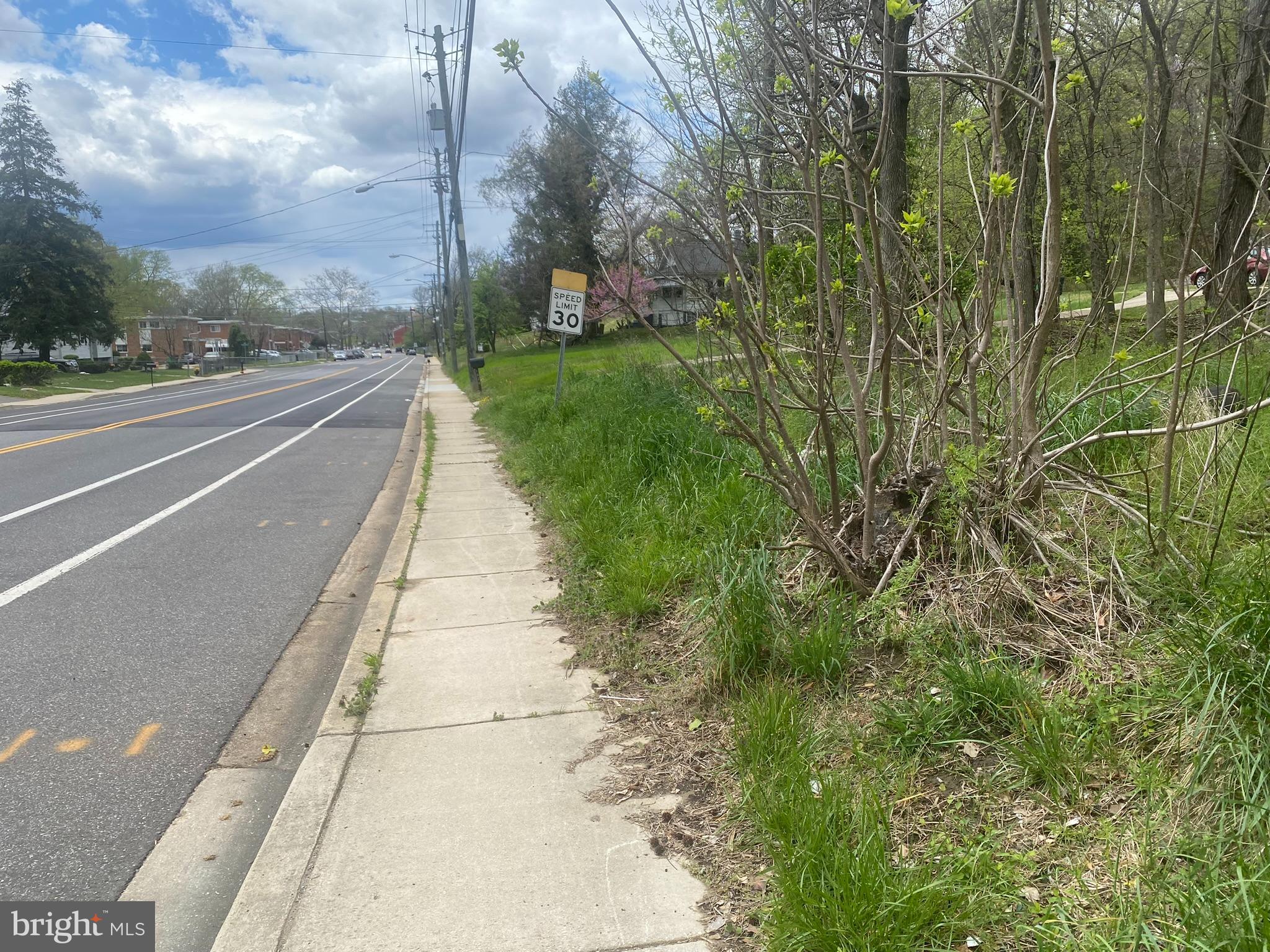 1030 Owens Road Oxon Hill, MD 20745 - Photo 4 of 11 a view of a street with a building