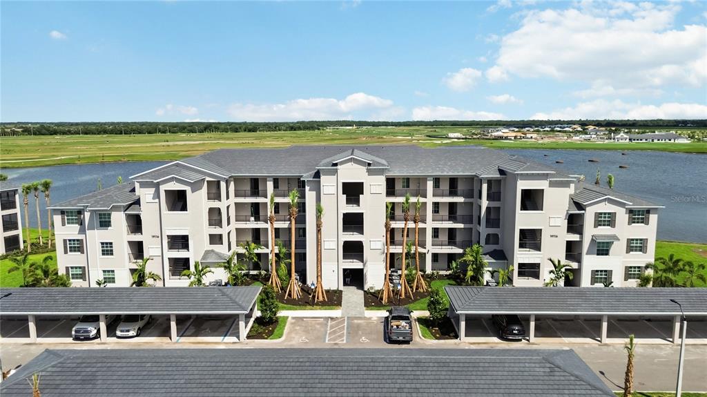 19116 Scallop Loop, Unit 403 Lakewood Ranch, FL 34211 - Photo 1 of 30