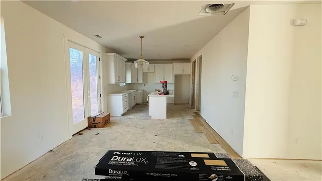 a view of a kitchen with a sink