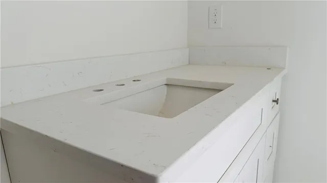 a view of a livingroom with a workspace