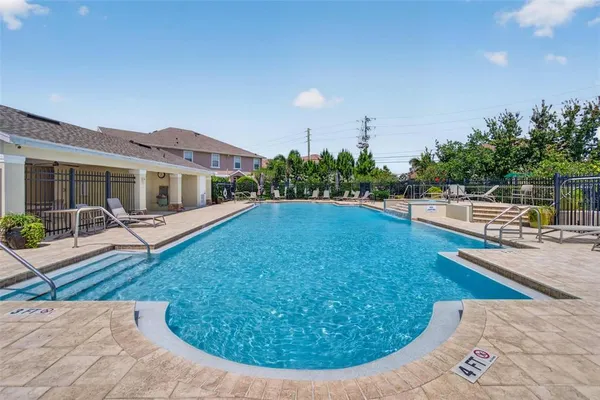 a view of a house with a swimming pool