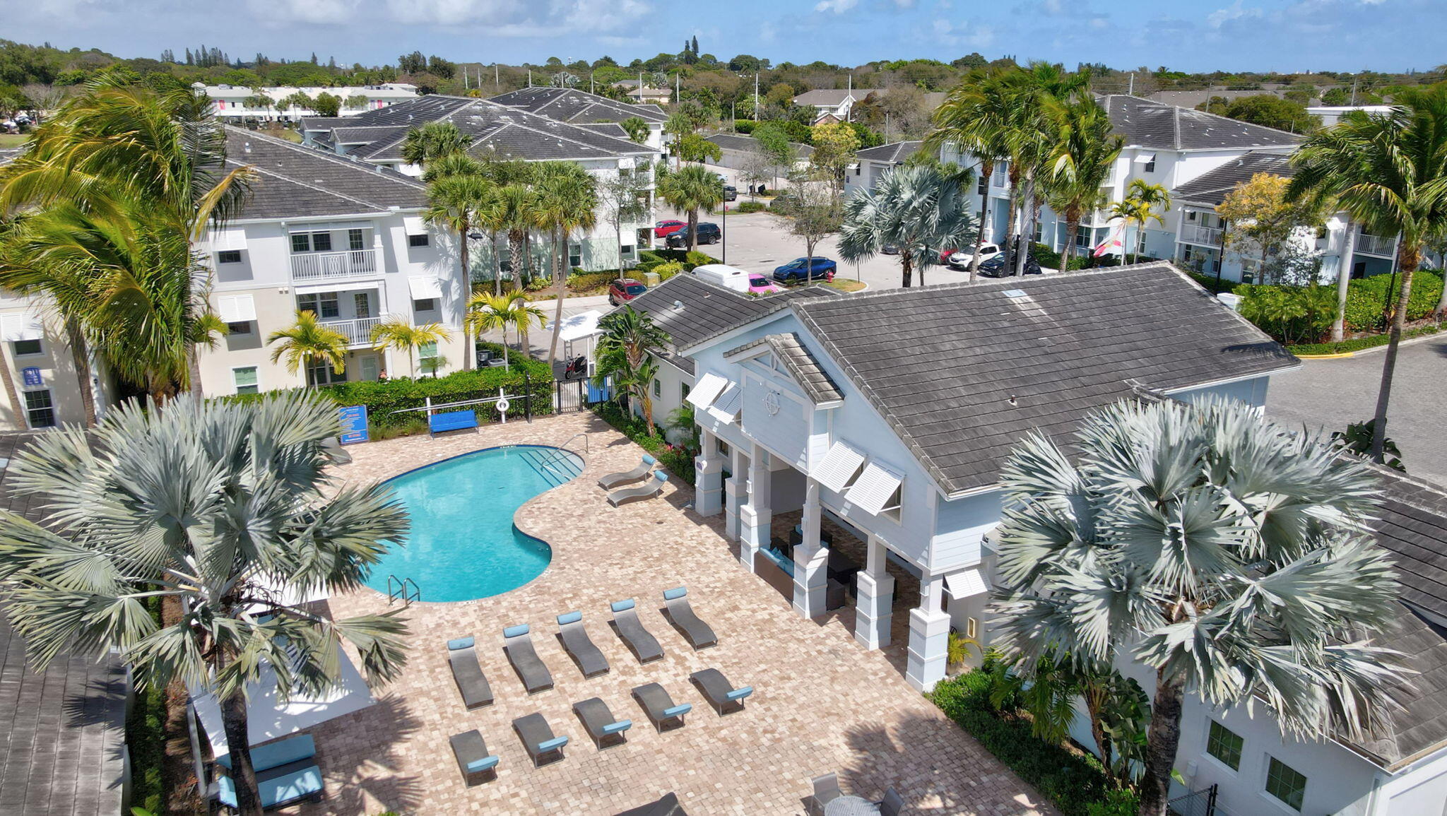 a view of multiple houses with a yard