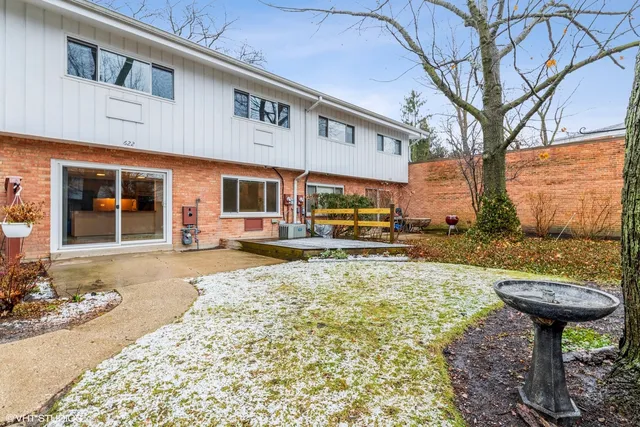 a view of a chairs and tables in the patio