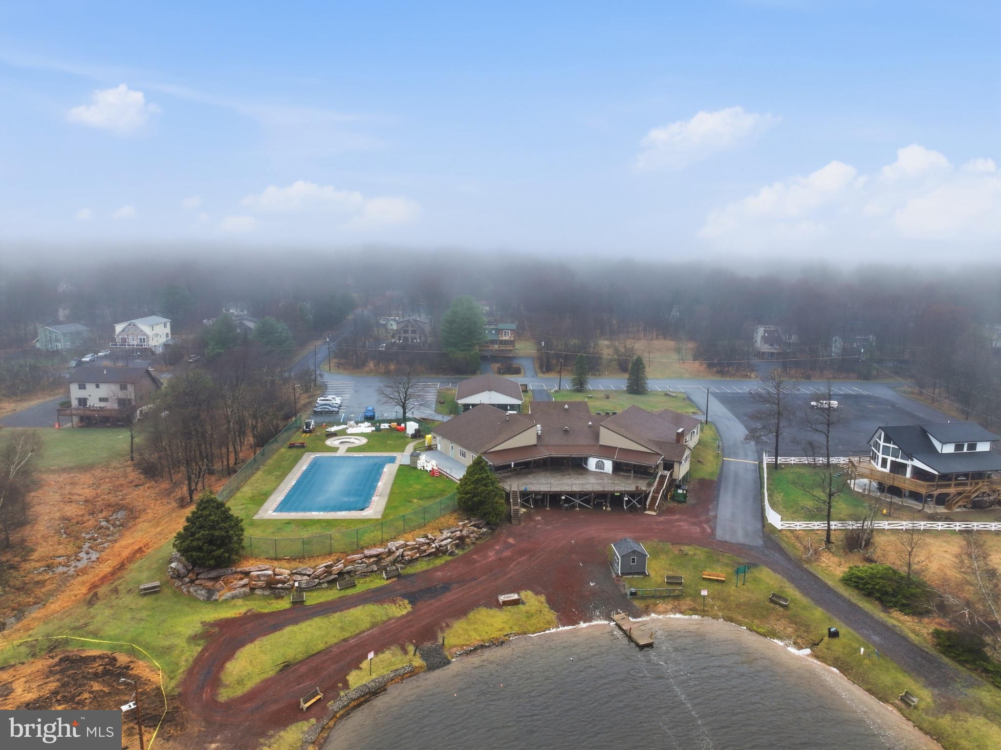 0 Stony Mountain Road Albrightsville, PA 18210 - Photo 22 of 24 Serene lakeside retreat with pool.