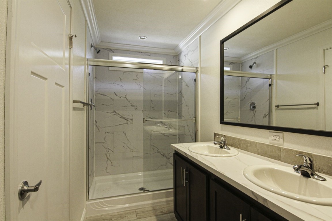 847 Airport Road, Unit 12 Breckenridge, CO 80424 - Photo 11 of 32 a bathroom with a shower sink and mirror