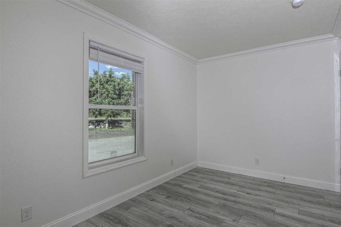 847 Airport Road, Unit 12 Breckenridge, CO 80424 - Photo 16 of 32 a view of an empty room with wooden floor and a window