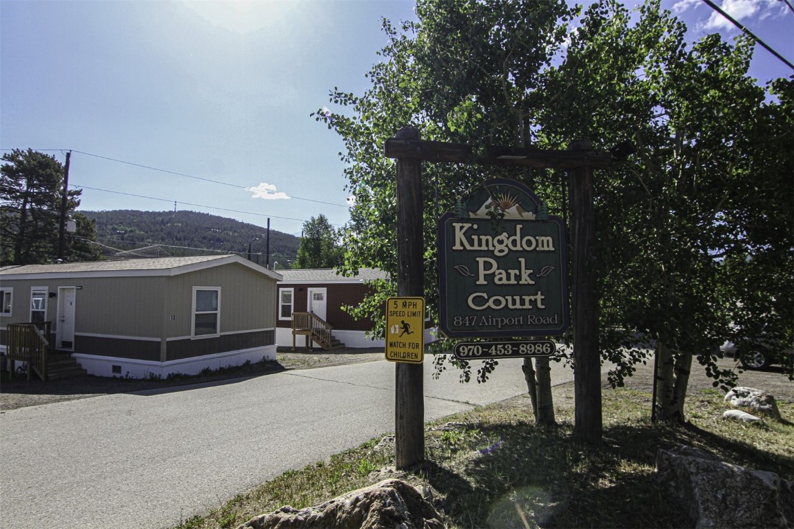 847 Airport Road, Unit 12 Breckenridge, CO 80424 - Photo 23 of 32 a sign on a pole on a street