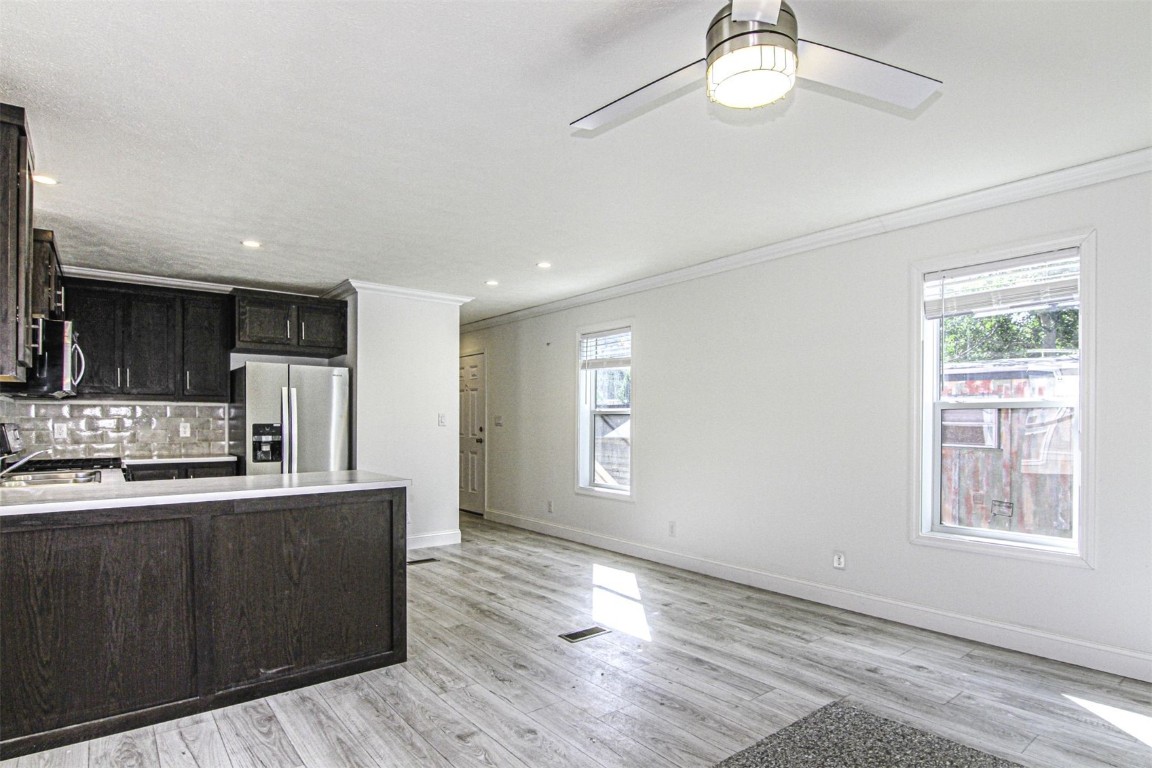 847 Airport Road, Unit 12 Breckenridge, CO 80424 - Photo 31 of 32 a kitchen with stainless steel appliances granite countertop a sink a stove a refrigerator cabinets and wooden floor